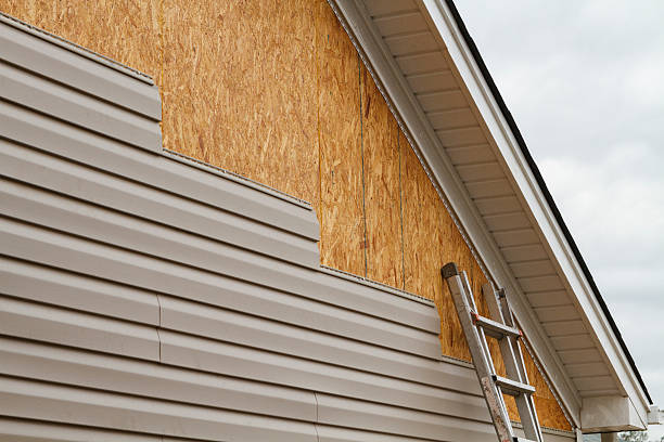 Professional Siding Replacement technician working in Southington, OH